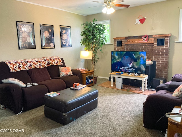 524 W 2nd St, Webb City, MO 64870 - carpeted living area with a ceiling fan, a brick fireplace, and crown molding