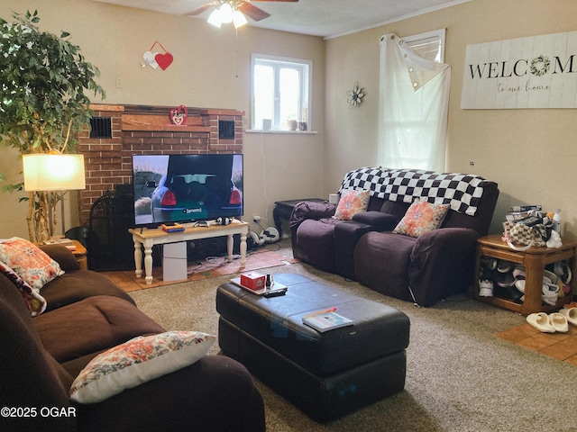 524 W 2nd St, Webb City, MO 64870 - living room featuring a ceiling fan, a fireplace, and carpet flooring