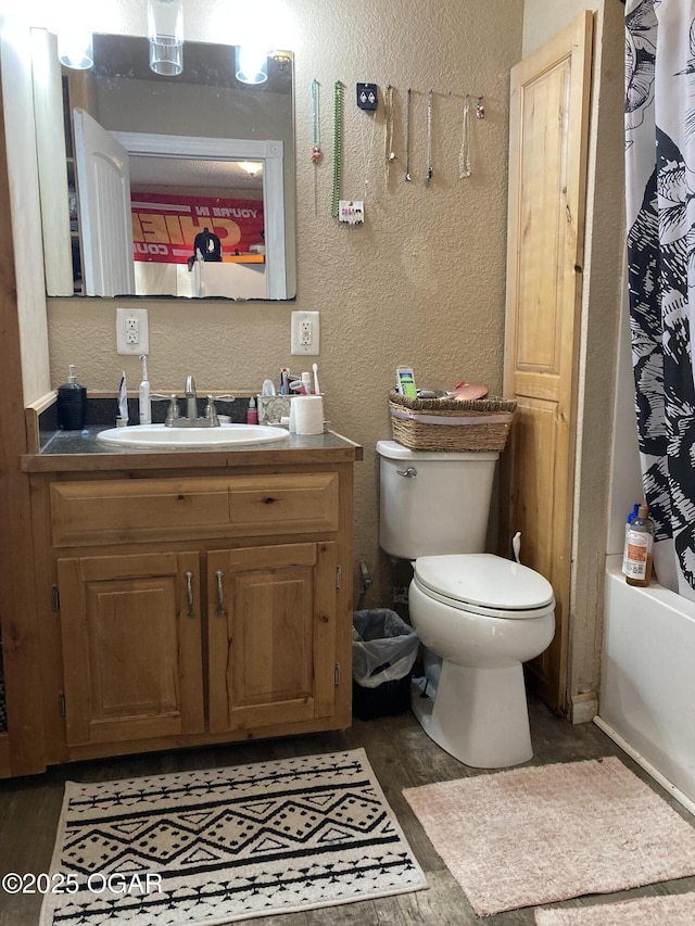 524 W 2nd St, Webb City, MO 64870 - full bathroom featuring vanity, a textured wall, and shower / bathtub combination with curtain