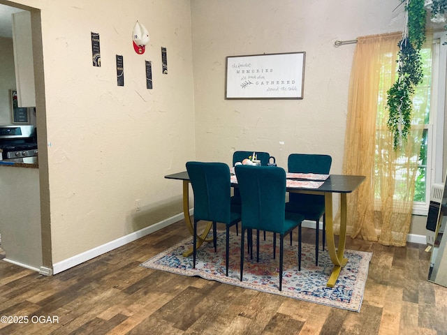 524 W 2nd St, Webb City, MO 64870 - dining space featuring healthy amount of natural light and wood finished floors