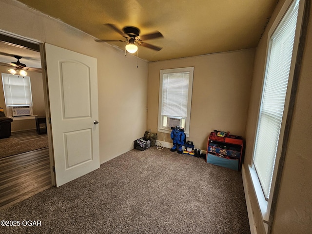 1109 Lincoln Ave, Baxter Springs, KS 66713 - unfurnished bedroom with cooling unit, carpet floors, and a ceiling fan