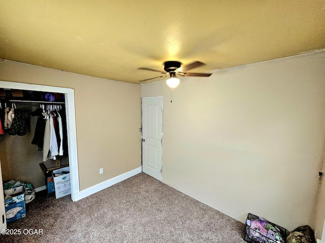 1109 Lincoln Ave, Baxter Springs, KS 66713 - unfurnished bedroom with carpet, a closet, and a ceiling fan