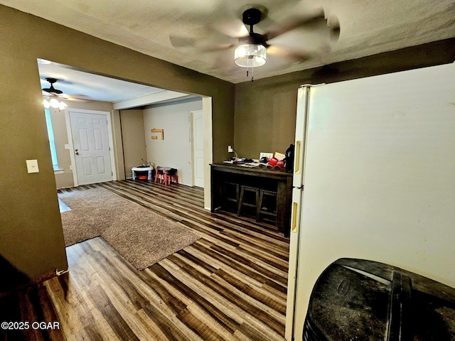 1109 Lincoln Ave, Baxter Springs, KS 66713 - interior space featuring a ceiling fan and wood finished floors
