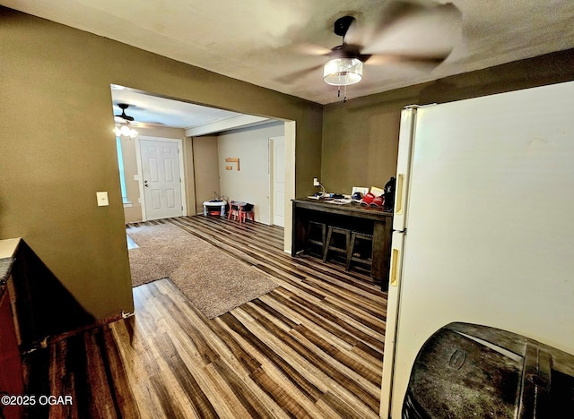 1109 Lincoln Ave, Baxter Springs, KS 66713 - interior space with a ceiling fan and wood finished floors