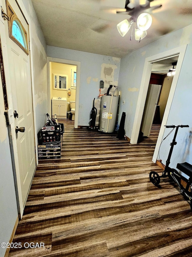 1109 Lincoln Ave, Baxter Springs, KS 66713 - interior space with water heater and baseboards