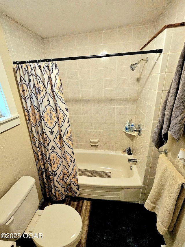 1109 Lincoln Ave, Baxter Springs, KS 66713 - bathroom featuring shower / bathtub combination with curtain and toilet