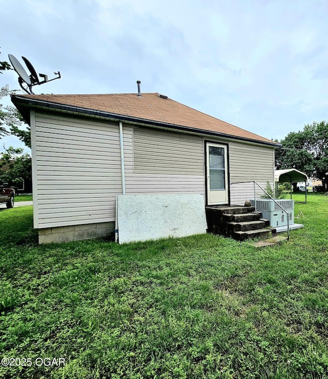 1109 Lincoln Ave, Baxter Springs, KS 66713 - back of house with a yard