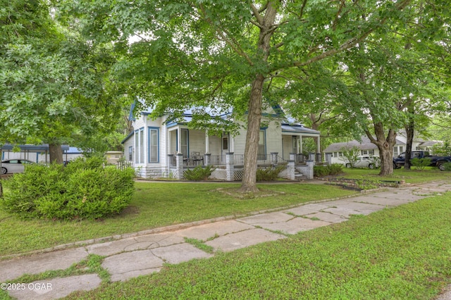 117 S 11th St, Sarcoxie, MO 64862 - view of front of home with covered porch and a front yard