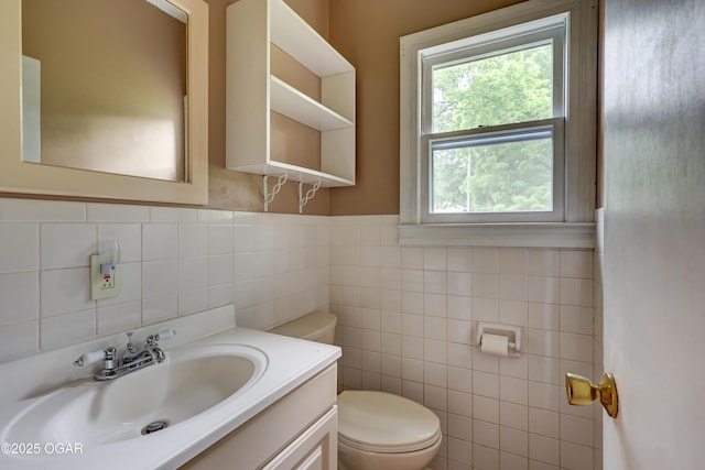 117 S 11th St, Sarcoxie, MO 64862 - bathroom featuring vanity and tile walls