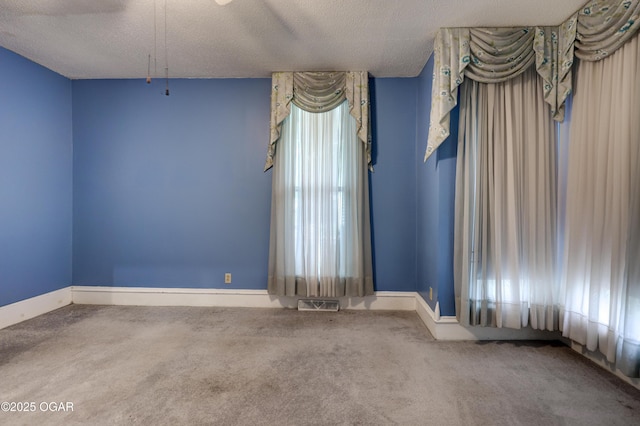 117 S 11th St, Sarcoxie, MO 64862 - carpeted spare room featuring a textured ceiling and a ceiling fan