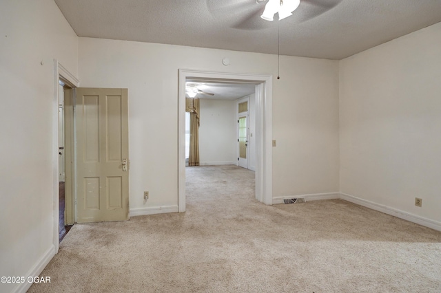 117 S 11th St, Sarcoxie, MO 64862 - carpeted empty room with a ceiling fan and a textured ceiling