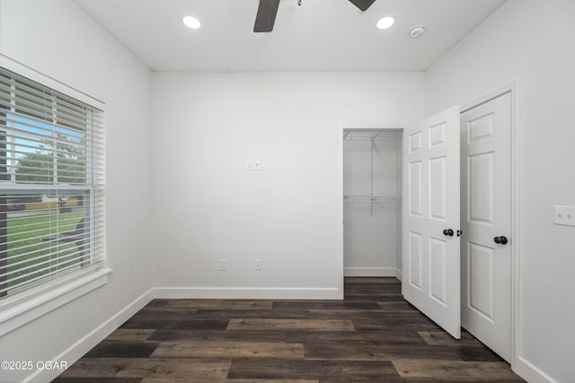 4610 W Amber Rd, Joplin, MO 64804 - unfurnished bedroom featuring recessed lighting, dark wood-style flooring, a closet, and ceiling fan