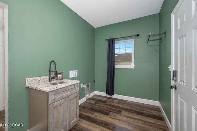 4610 W Amber Rd, Joplin, MO 64804 - washroom featuring washer hookup, cabinet space, and dark wood-style flooring