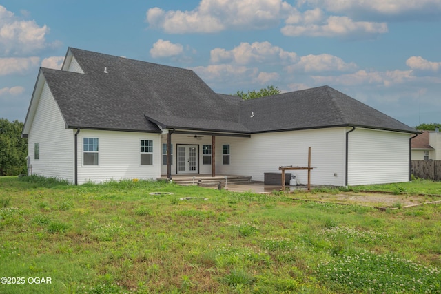 4610 W Amber Rd, Joplin, MO 64804 - back of property featuring french doors, a patio, a shingled roof, and a ceiling fan