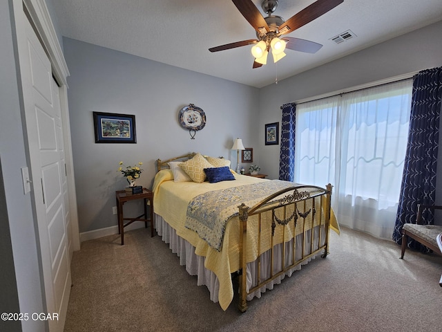 12673 Ibex Rd, Neosho, MO 64850 - carpeted bedroom with a ceiling fan and baseboards