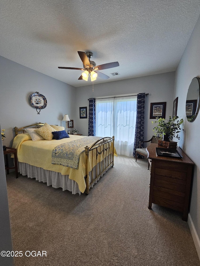 12673 Ibex Rd, Neosho, MO 64850 - carpeted bedroom with a textured ceiling and a ceiling fan