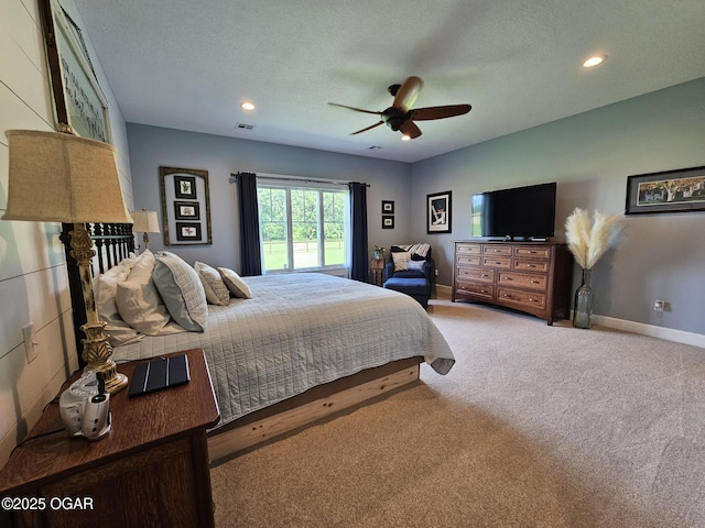 12673 Ibex Rd, Neosho, MO 64850 - carpeted bedroom with ceiling fan, recessed lighting, and a textured ceiling