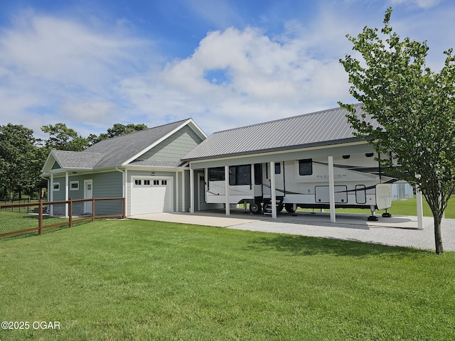 12673 Ibex Rd, Neosho, MO 64850 - view of front facade with a garage, driveway, and a metal roof