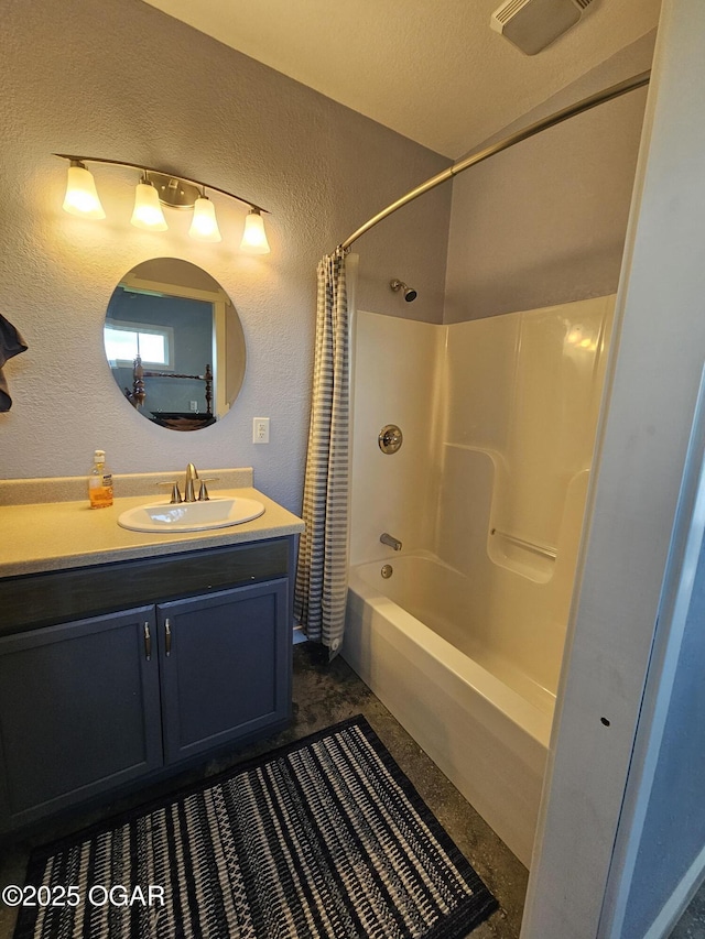 12673 Ibex Rd, Neosho, MO 64850 - bathroom with a textured wall, shower / bath combo with shower curtain, and vanity
