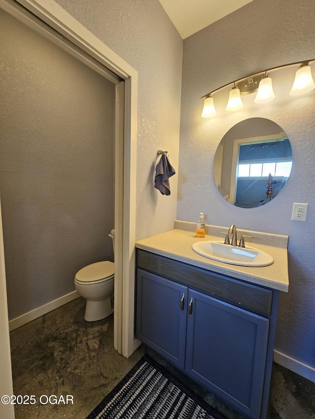 12673 Ibex Rd, Neosho, MO 64850 - bathroom with vanity and a textured wall