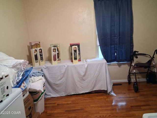 827 W Chestnut St, Carthage, MO 64836 - bedroom with wood finished floors
