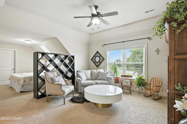 1641 Alexandra Dr, Carthage, MO 64836 - living room featuring ceiling fan and light colored carpet