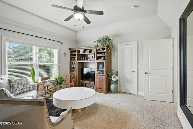 1641 Alexandra Dr, Carthage, MO 64836 - living area featuring carpet floors, a ceiling fan, and vaulted ceiling