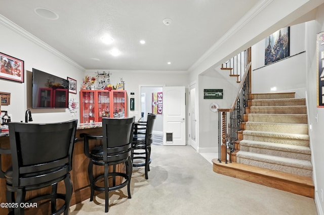 1641 Alexandra Dr, Carthage, MO 64836 - indoor wet bar with carpet flooring, stairs, ornamental molding, and recessed lighting