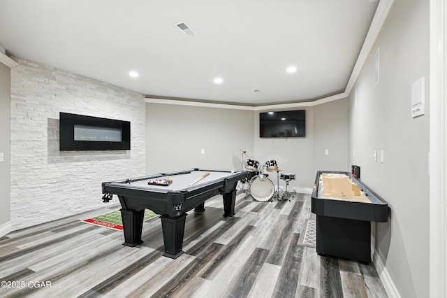 1641 Alexandra Dr, Carthage, MO 64836 - rec room with pool table, wood finished floors, crown molding, and recessed lighting
