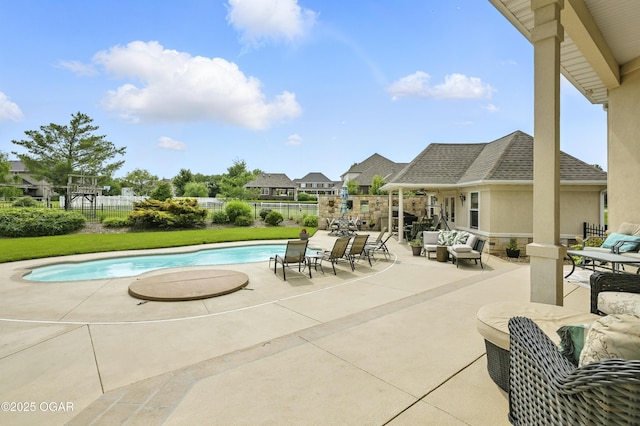 1641 Alexandra Dr, Carthage, MO 64836 - view of swimming pool featuring an outdoor living space and a patio