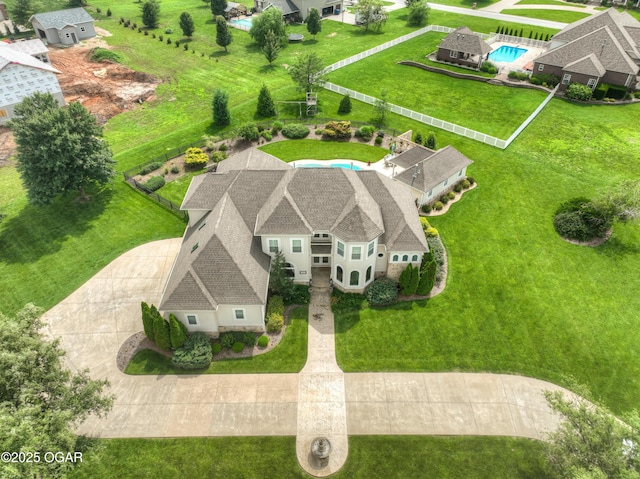1641 Alexandra Dr, Carthage, MO 64836 - aerial view of property and surrounding area with a pool area