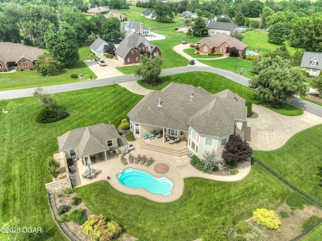 1641 Alexandra Dr, Carthage, MO 64836 - aerial perspective of suburban area featuring a pool area