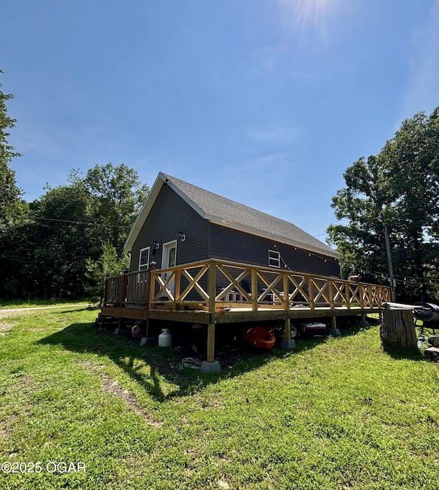 17568 Jordan Ln, Neosho, MO 64850 - rear view of house with a deck and a yard