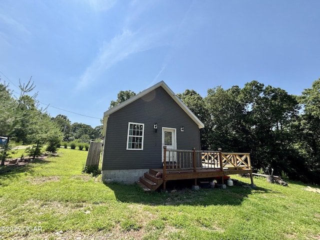 17568 Jordan Ln, Neosho, MO 64850 - rear view of house with a deck and a lawn
