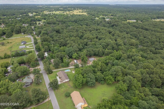 214 S Ozark Trl, Goodman, MO 64843 - view of property location featuring a forest