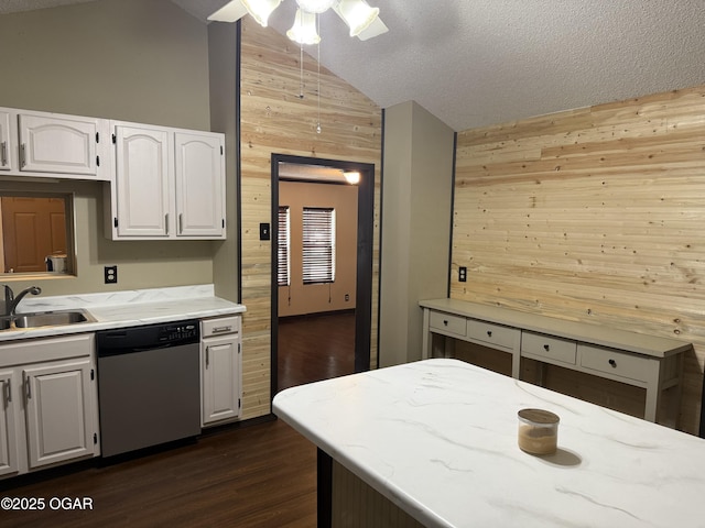 1310 Regan Ave, Carthage, MO 64836 - kitchen with wooden walls, dishwasher, ceiling fan, dark wood-type flooring, and high vaulted ceiling
