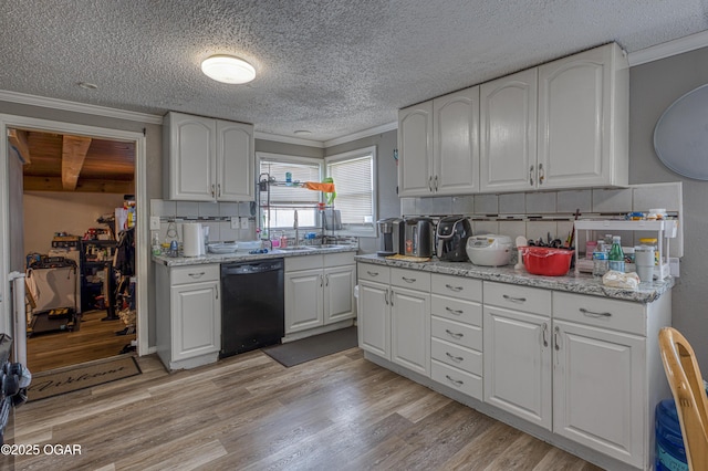 602 N Grand St, Pittsburg, KS 66762 - kitchen featuring dishwasher, crown molding, backsplash, white cabinets, and light wood finished floors