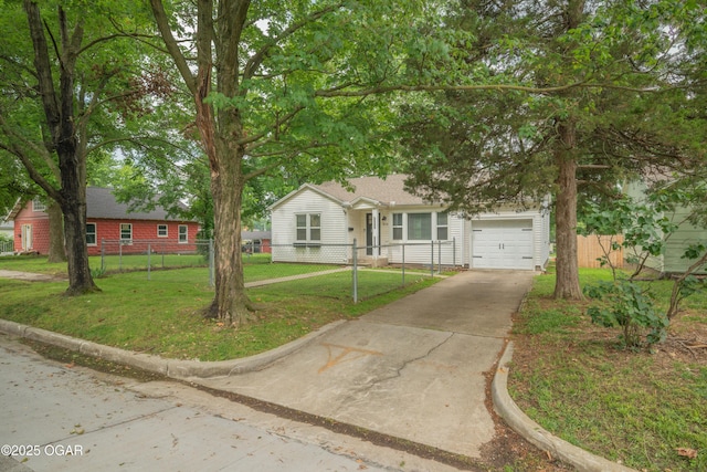 424 S Mcconnell Ave, Joplin, MO 64801 - view of property hidden behind natural elements featuring driveway and a garage