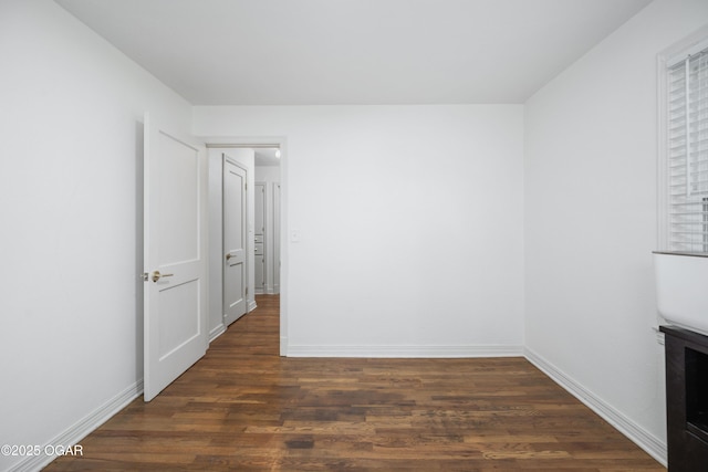 424 S Mcconnell Ave, Joplin, MO 64801 - unfurnished bedroom with dark wood-style floors