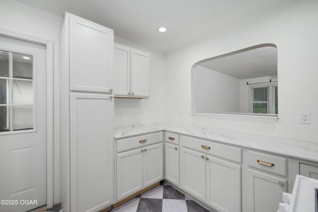 424 S Mcconnell Ave, Joplin, MO 64801 - kitchen with white cabinetry, light stone countertops, and recessed lighting
