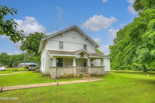 7614 Apple, Sarcoxie, MO 64862 - view of front facade featuring a porch, a detached carport, and a front yard