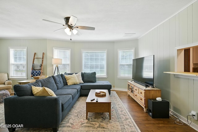 301 N 1st St, Jasper, MO 64755 - living room with crown molding, dark wood finished floors, and ceiling fan