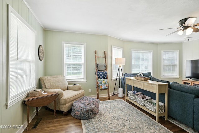 301 N 1st St, Jasper, MO 64755 - living room with a ceiling fan, ornamental molding, and wood finished floors