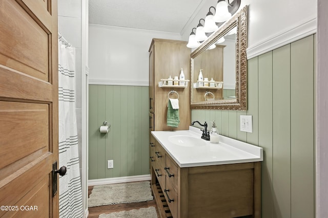 301 N 1st St, Jasper, MO 64755 - full bathroom featuring vanity, wood finished floors, and crown molding
