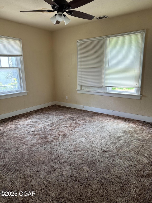 206 N Picher, Joplin, MO 64801 - unfurnished room with healthy amount of natural light, ceiling fan, and carpet