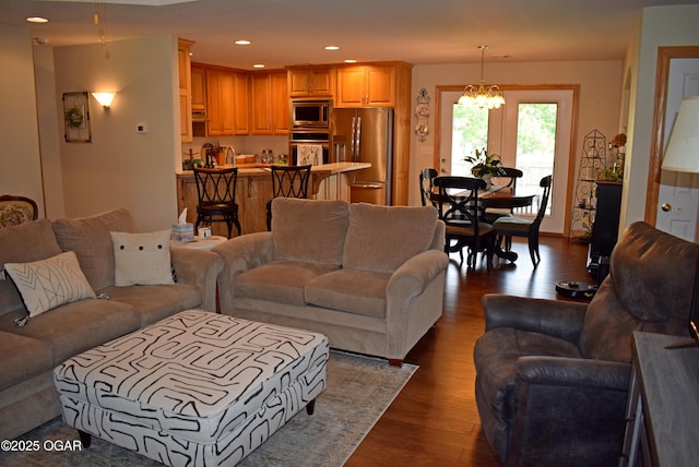 1902 E Natalie Ln, Joplin, MO 64801 - living area featuring dark wood-style flooring, a chandelier, and recessed lighting