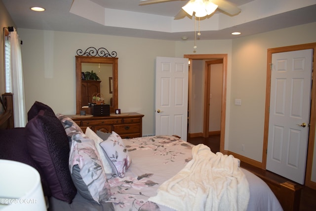 1902 E Natalie Ln, Joplin, MO 64801 - bedroom with a raised ceiling, recessed lighting, ceiling fan, and wood finished floors