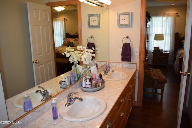 1902 E Natalie Ln, Joplin, MO 64801 - ensuite bathroom with wood finished floors and double vanity