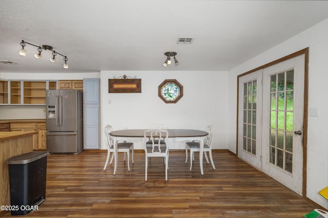 645 Worth St, Granby, MO 64844 - dining room featuring dark wood finished floors, french doors, and healthy amount of natural light