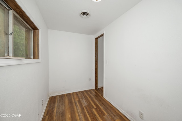 645 Worth St, Granby, MO 64844 - unfurnished room with wood finished floors and baseboards